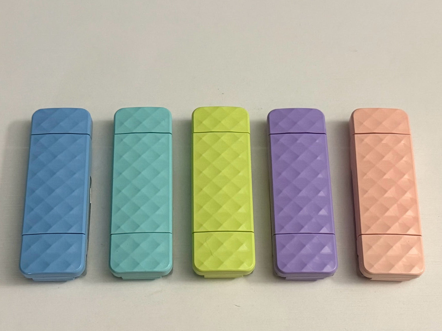 Ever After Creations portable LED task lights in blue, teal, lime, purple, and peach with diamond-textured finish.