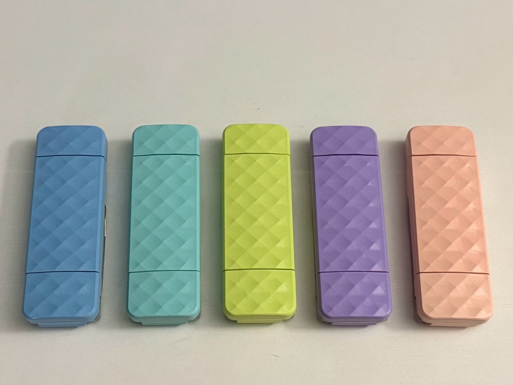 Ever After Creations portable LED task lights in blue, teal, lime, purple, and peach with diamond-textured finish.