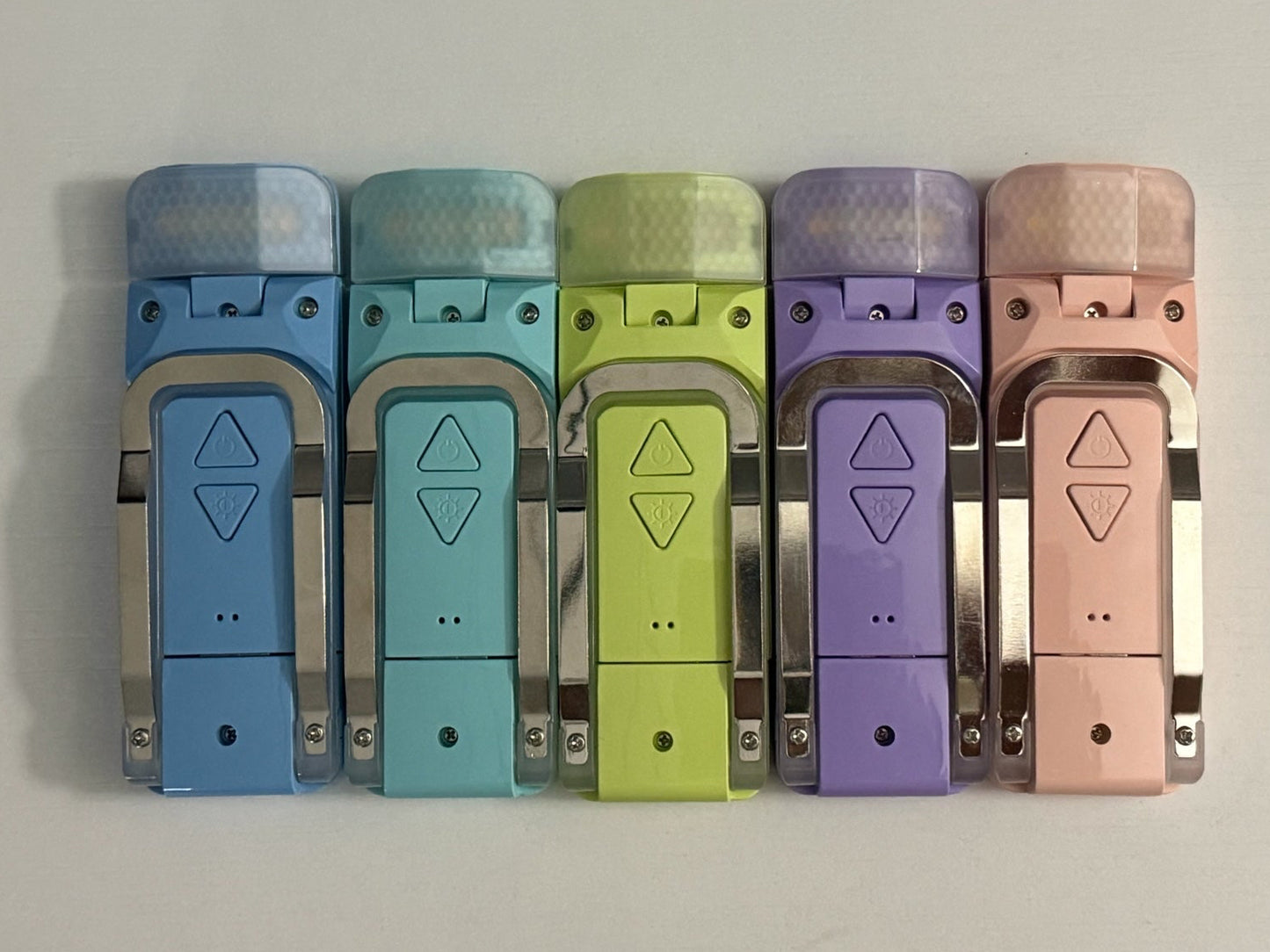Ever After Creations portable rechargeable LED task lights in a row featuring pastel colors and diamond textures.